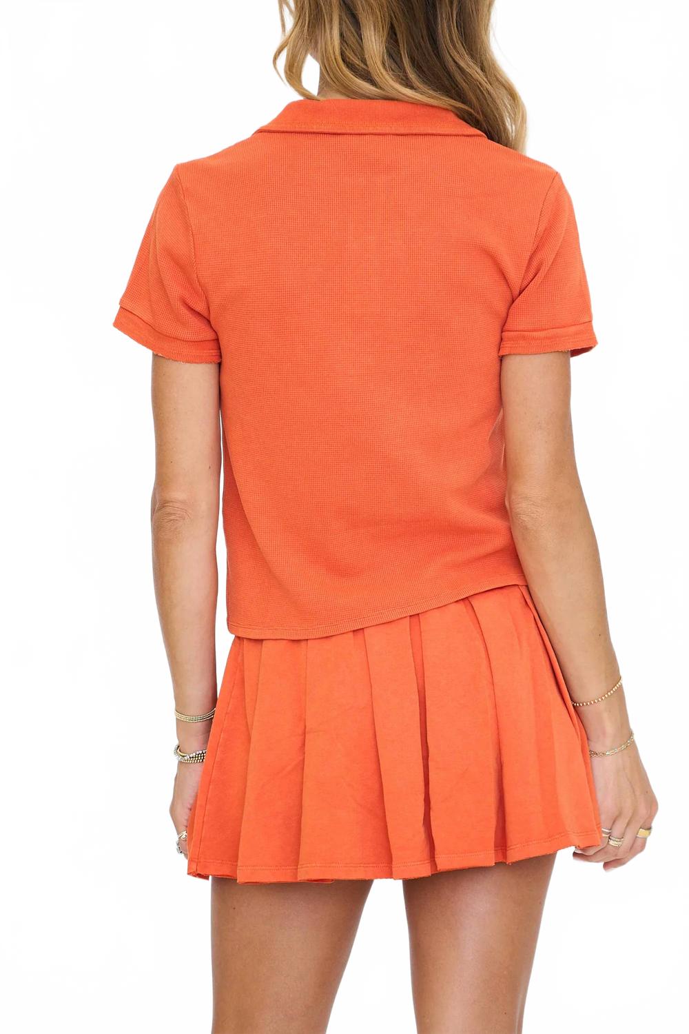 Polo Shirt Set With Pleated Flare Skort In Orange