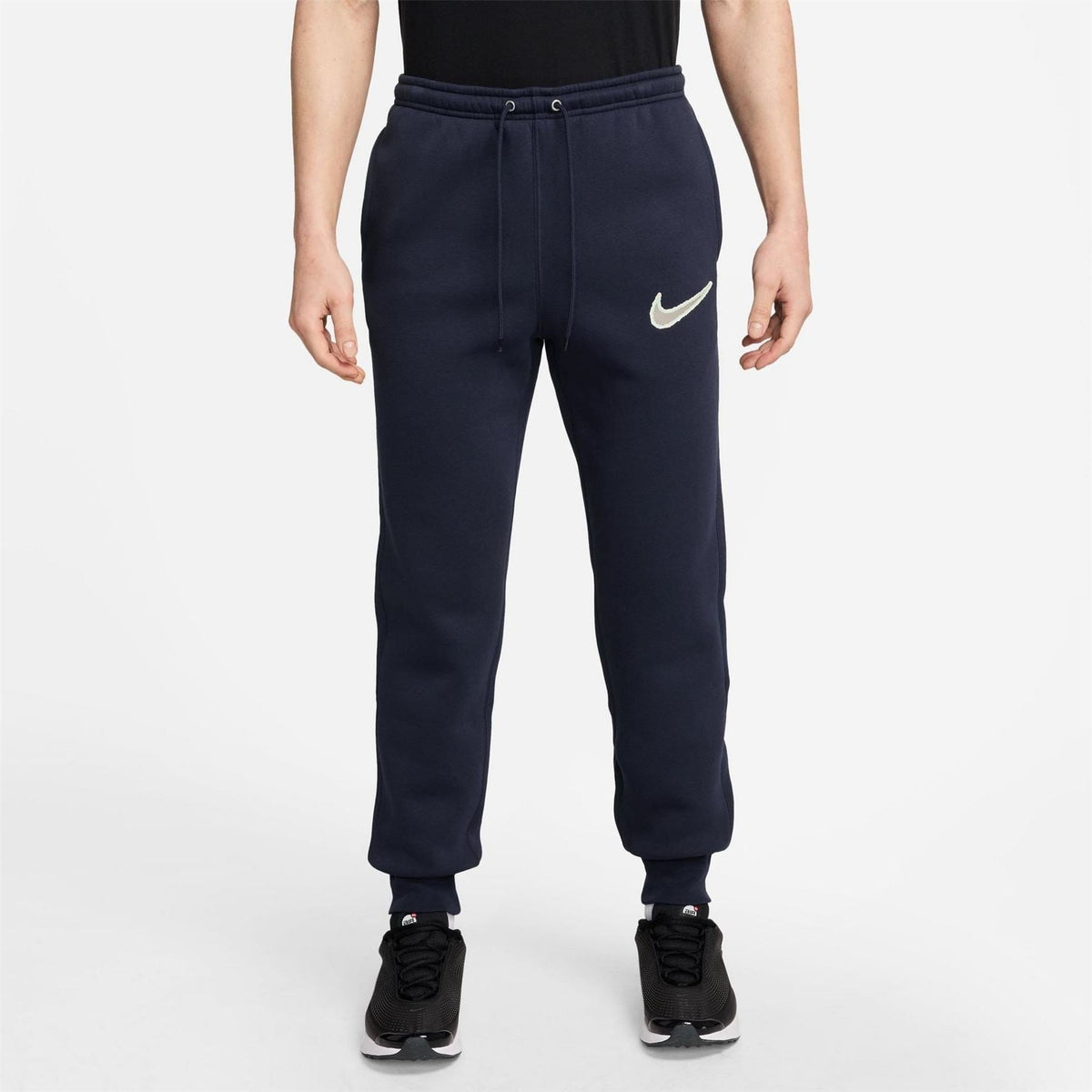 Nike Club Solid Patterned Slim Joggers