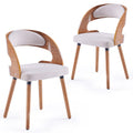 Upholstered Dining Chairs with Elegant Curved Back Designs
