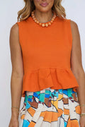 Solid Sleeveless Micro Knit Peplum Top In Burnt Orange
