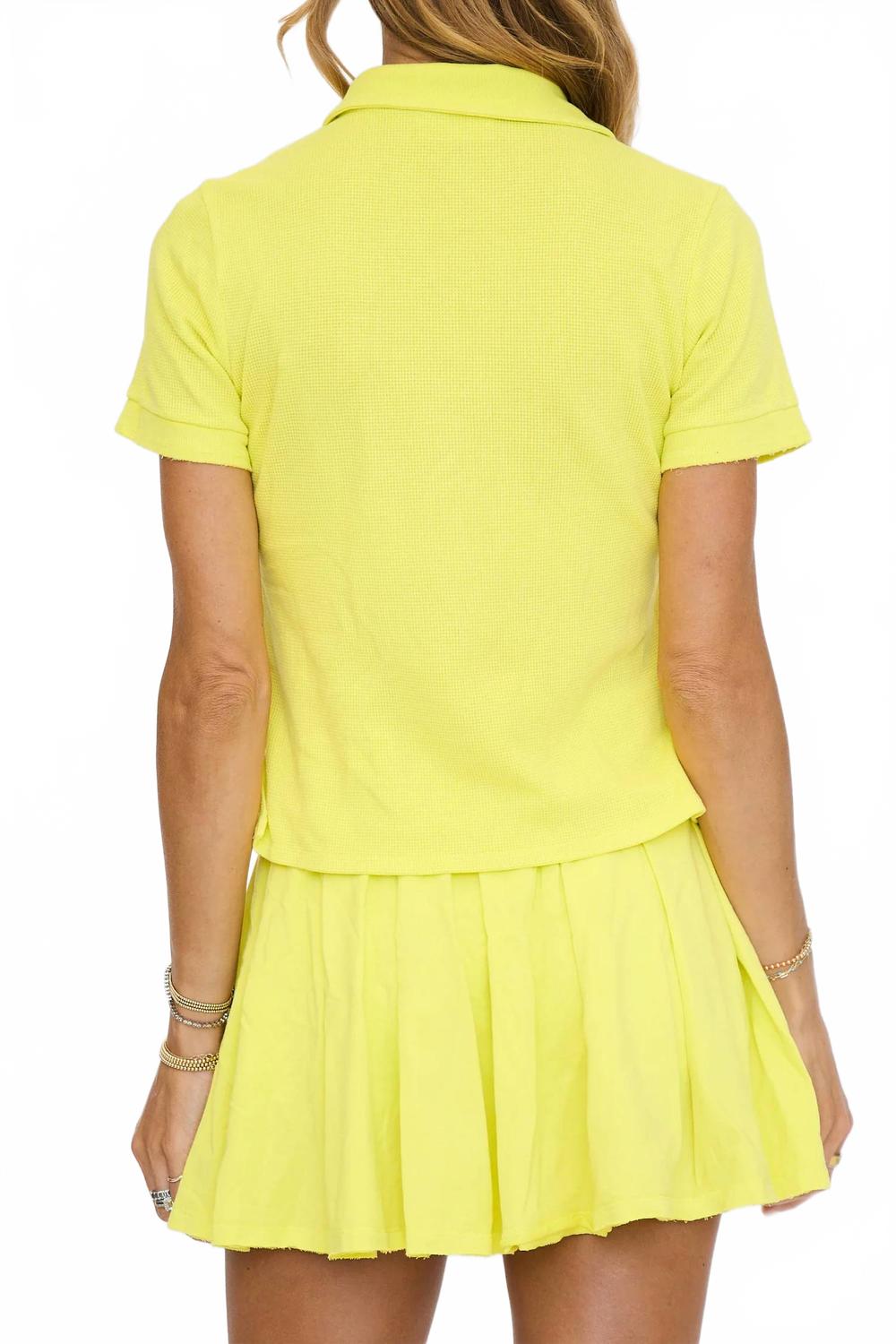 Polo Shirt Set With Pleated Flare Skort In Lemon