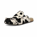Women’s Cowhide Mules In Black/ White